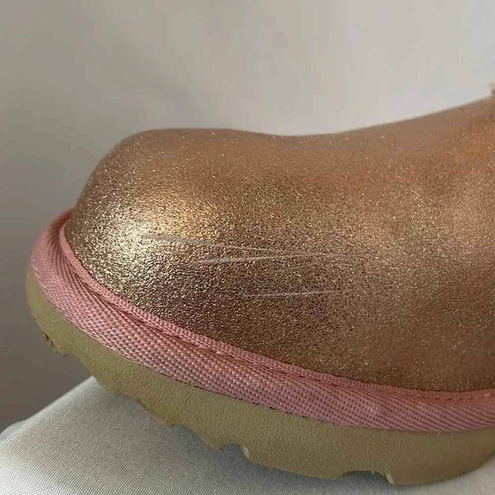 UGG boots size 6 metallic rose gold trimmed in pink with tan soles